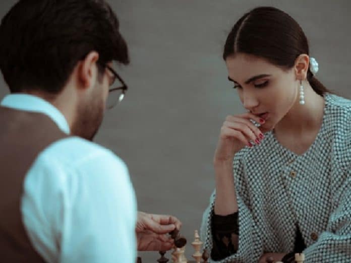 Couple playing chess