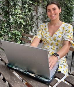 Riannon Palmer in her garden at the keyboard